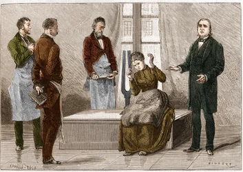 Catalepsy produzida sob a influência do som (Diapason). O neurologista francês Jean Martin Charcot (1825-1893) (à direita) demonstra hipnose em um paciente no hospital de Salpetriere. Ilustração tirada da "Natureza" 1879