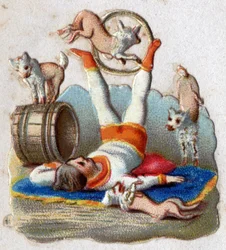 Circo: um domador de animais que faz capturas tem cães, incluindo um que passa em um aro. Cromolitografia por volta de 1890.