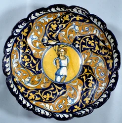 Godronnee faience cup decoree de um angelot. Paris do século XVI, Museu do Louvre