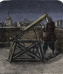 Isaac Newton (1642-1727) físico inglês usando o seu telescópio.