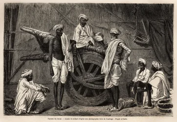 Camponeses de Scind (região de Punjab, Índia), junto à sua maquinaria agrícola. Gravura para ilustrar a viagem a Pandjab e Caxemira, história de Guillaume Lejean, em 1866, publicada na "Le tour du monde, nouveau journal des voyages", sob a direcção