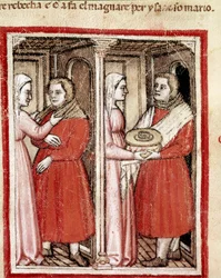 Rebecca dá ao seu filho Jacob, com as roupas de Esaú, um prato de carne de cabrito para que ele a possa levar ao seu pai cego Isaac e levar a sua bênção em vez da Esaú Miniatura do Codex 212 (ou padovano ou Bíblia de Pádua) 1390-1400 Rovigo, Accademia dei 