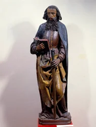 Representação de São Paulo segurando um livro na mão. Escultura em madeira policromada. Século XV. Chartres, Museu de Belas Artes.