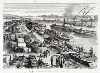 Aterragem de mercadorias numa doca no Canal do Suez
