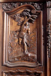 O martírio de San Sebastián, detalhe da porta de madeira esculpida da igreja da concepção imaculada, Menton.