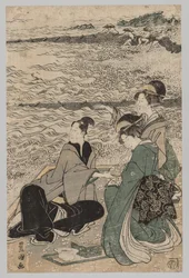 Homem e duas mulheres à beira-mar