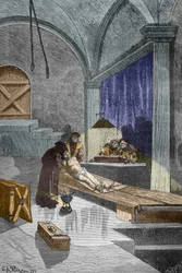O padre Pierre Aupetit acusado de feitiçaria posto sob tortura antes de ser queimado vivo, 25/05/1588 (gravura)