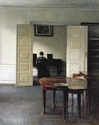 Um interior com uma mulher tocando piano, 1910