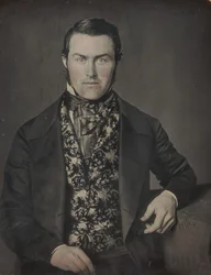 Homem sentado em colete floral, anos 1840-50