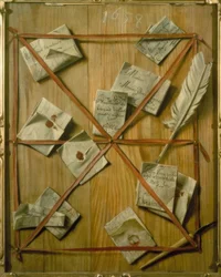 Um quadro com letras fixadas a ele