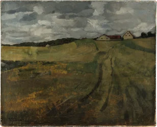 Campo de restolho com caminho ascendente perto de Weßling