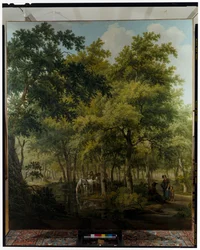 Camponeses com uma carroça perto da margem de um rio numa cena de floresta