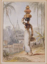 Uma mulher hindu carregando um pote de água