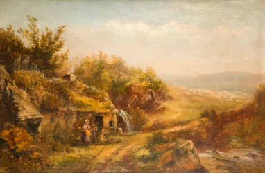 Casa de campo e roda de moinho,