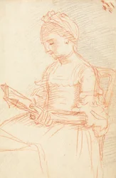 Senhora sentada com livro