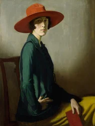 Senhora com um chapéu vermelho