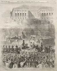 A procissão inaugural em Washington, ao passar pelo portão do recinto do Capitólio